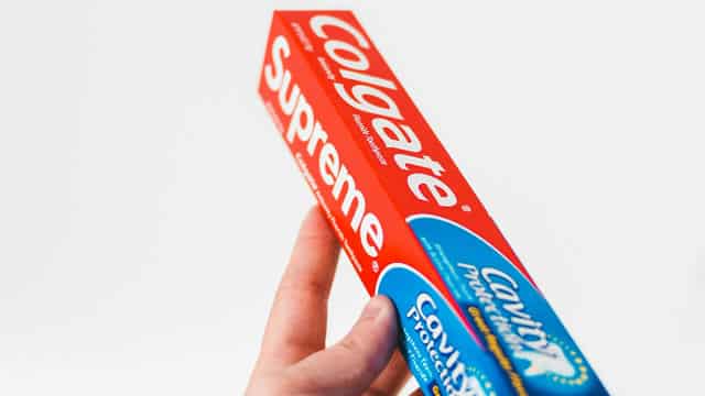 Dow Moves Lower; Colgate-Palmolive Earnings Top Views