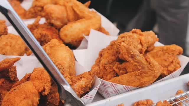 Gold Gains 1%; Wingstop Shares Spike Higher