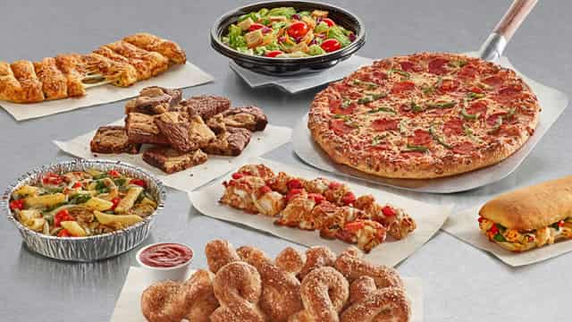 Domino's customers are avoiding delivery and picking up their pizzas to save money