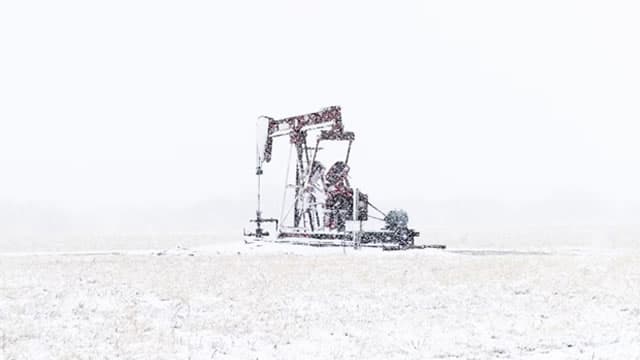 OPEC oil output slips in November despite agreed hike, survey finds